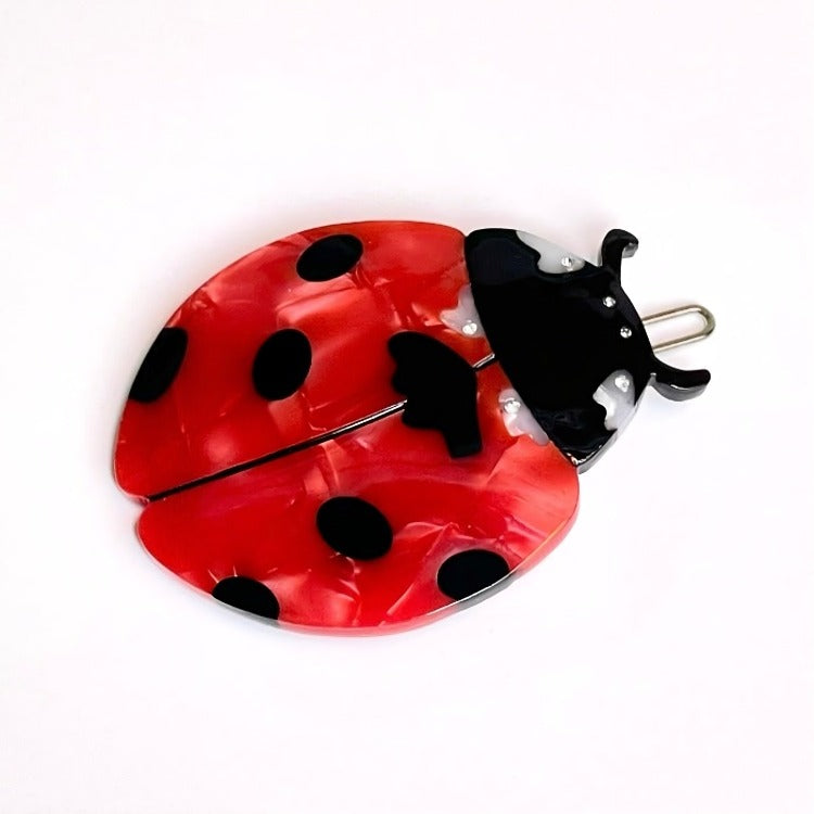Ladybug hair clip.
