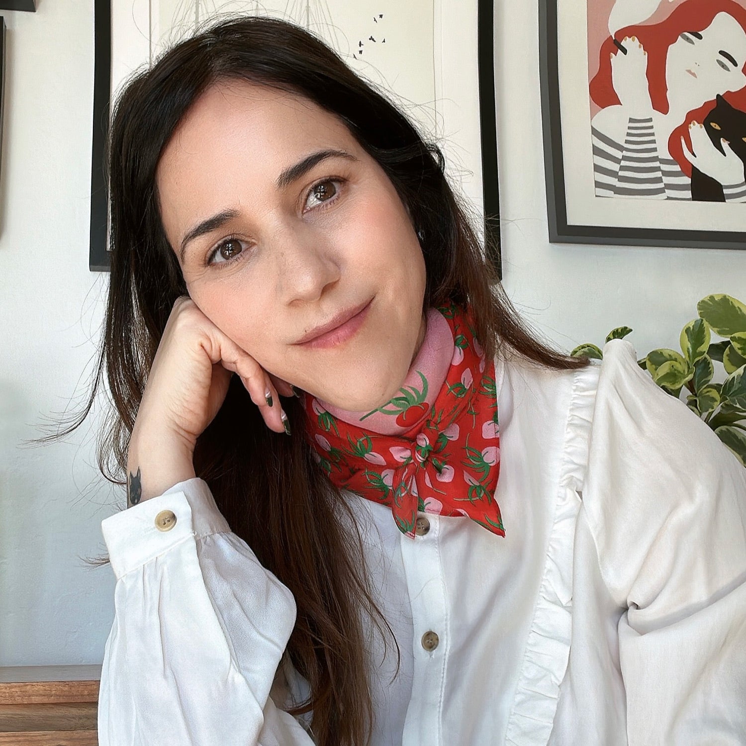 cristina, centinelle's founder and designer at studio, wearing Tomatoes cotton silk bandana in red and pink