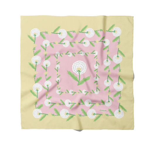 A pink and yellow bandana with dandelions on it.