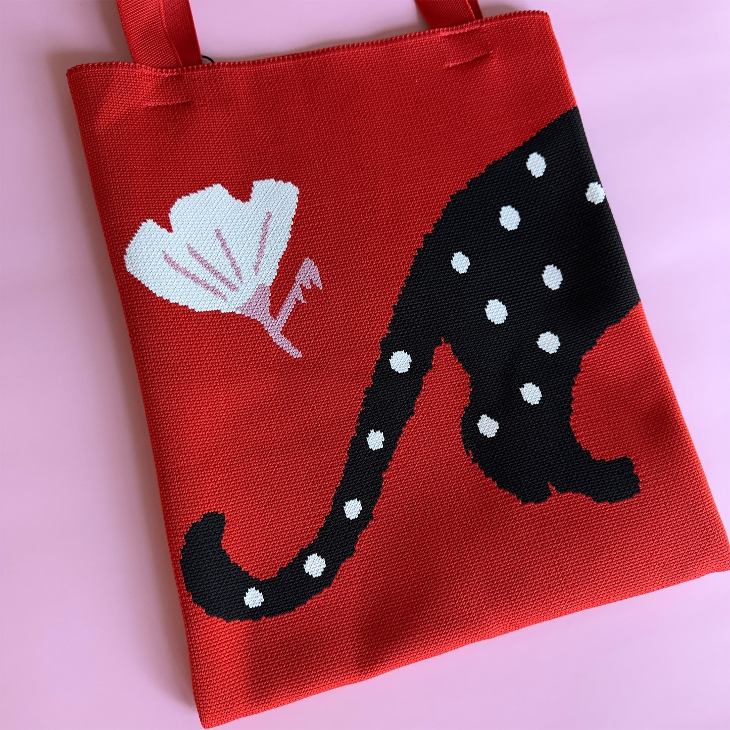 Polka cat with polka dots knit tote bag in red and black.