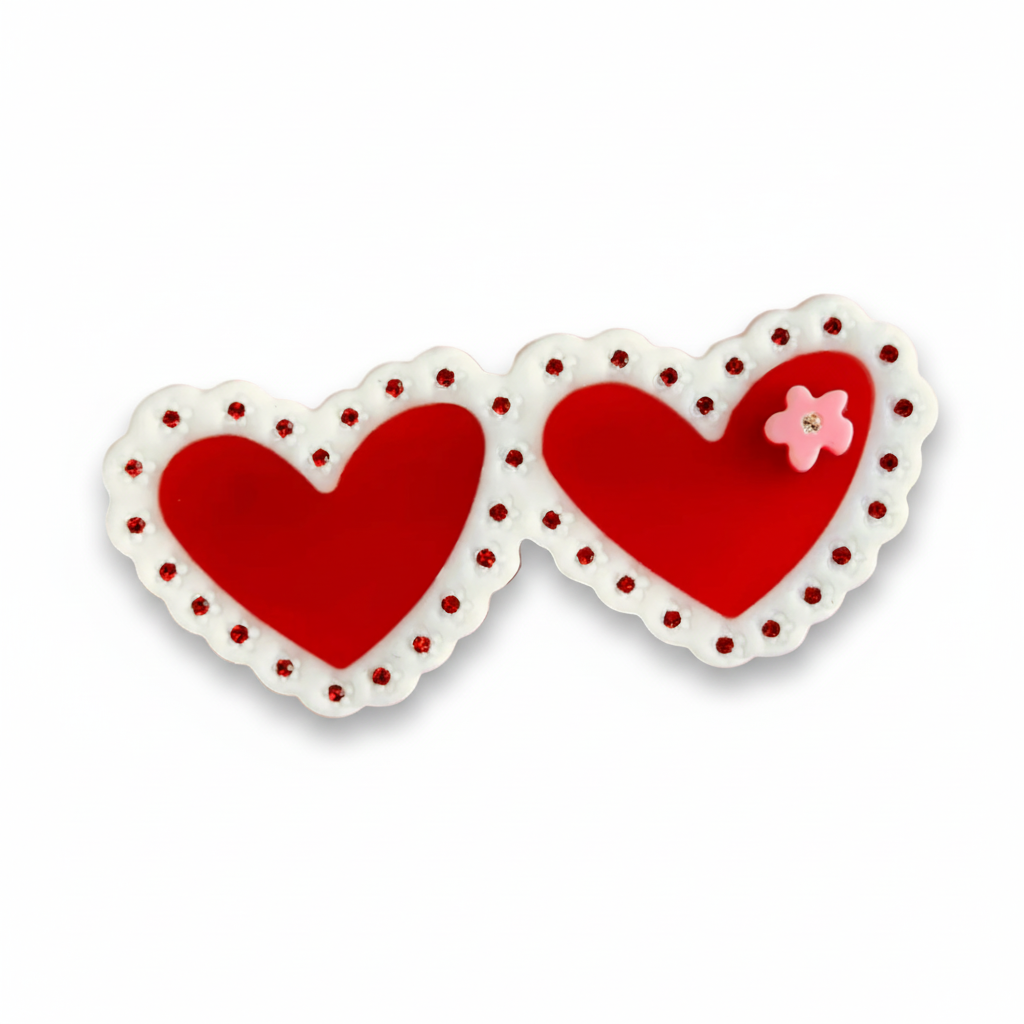 Laced hearts hair clip red and white from Centinelle
