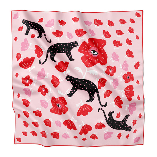 Black leopards and red poppies on a silk bandana.