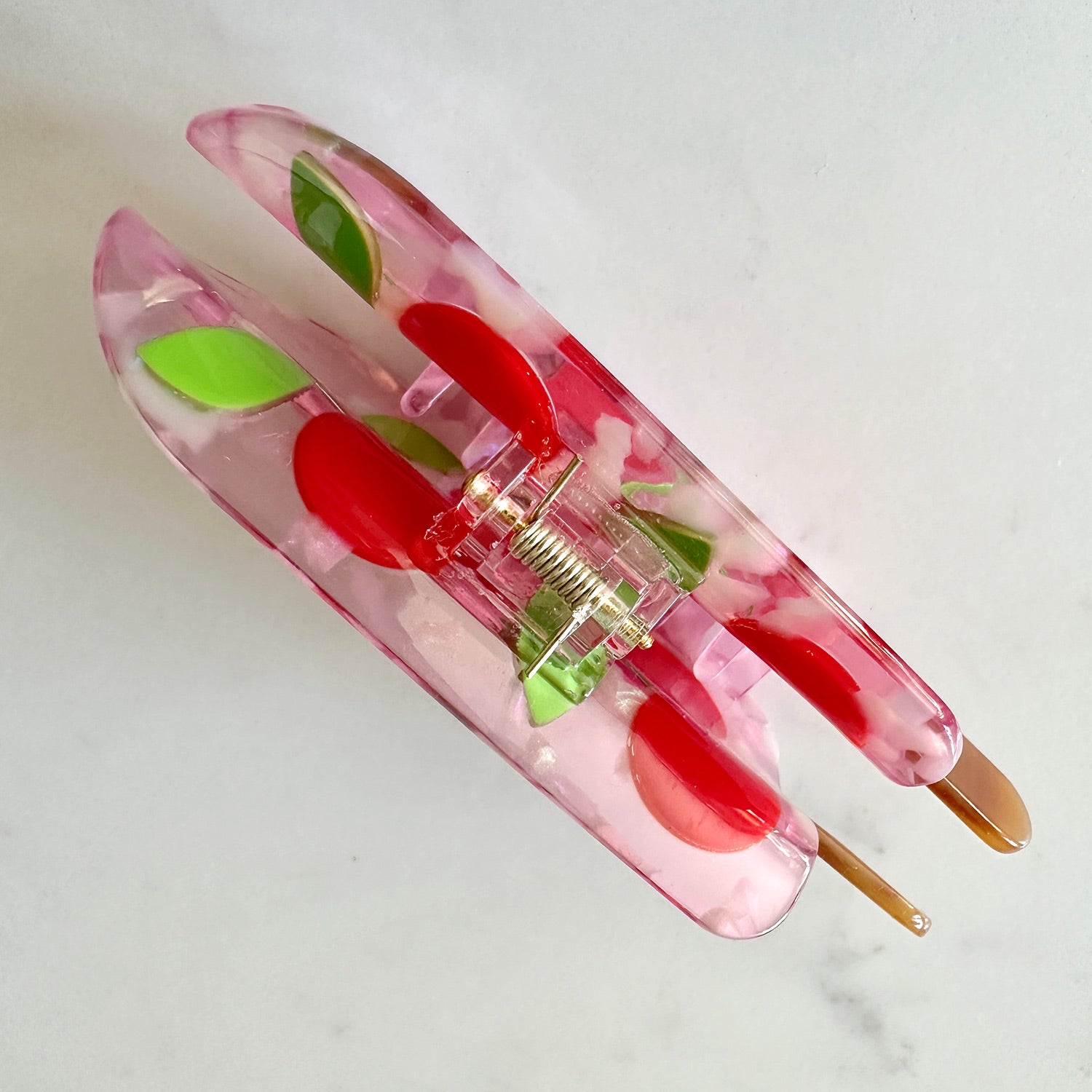 Keep it cool with our Cherry popsicle hair claw, with red cherries with crystals and pink translucent cellulose acetate