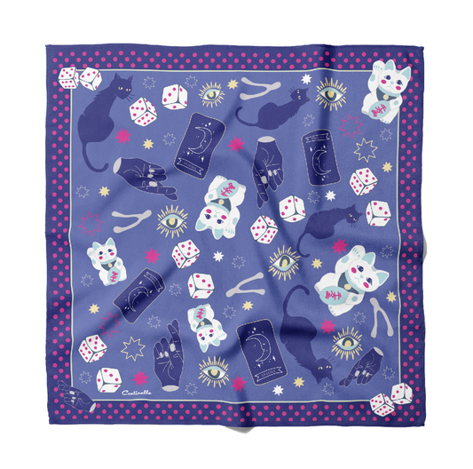 A purple bandana with cats and dice on it.