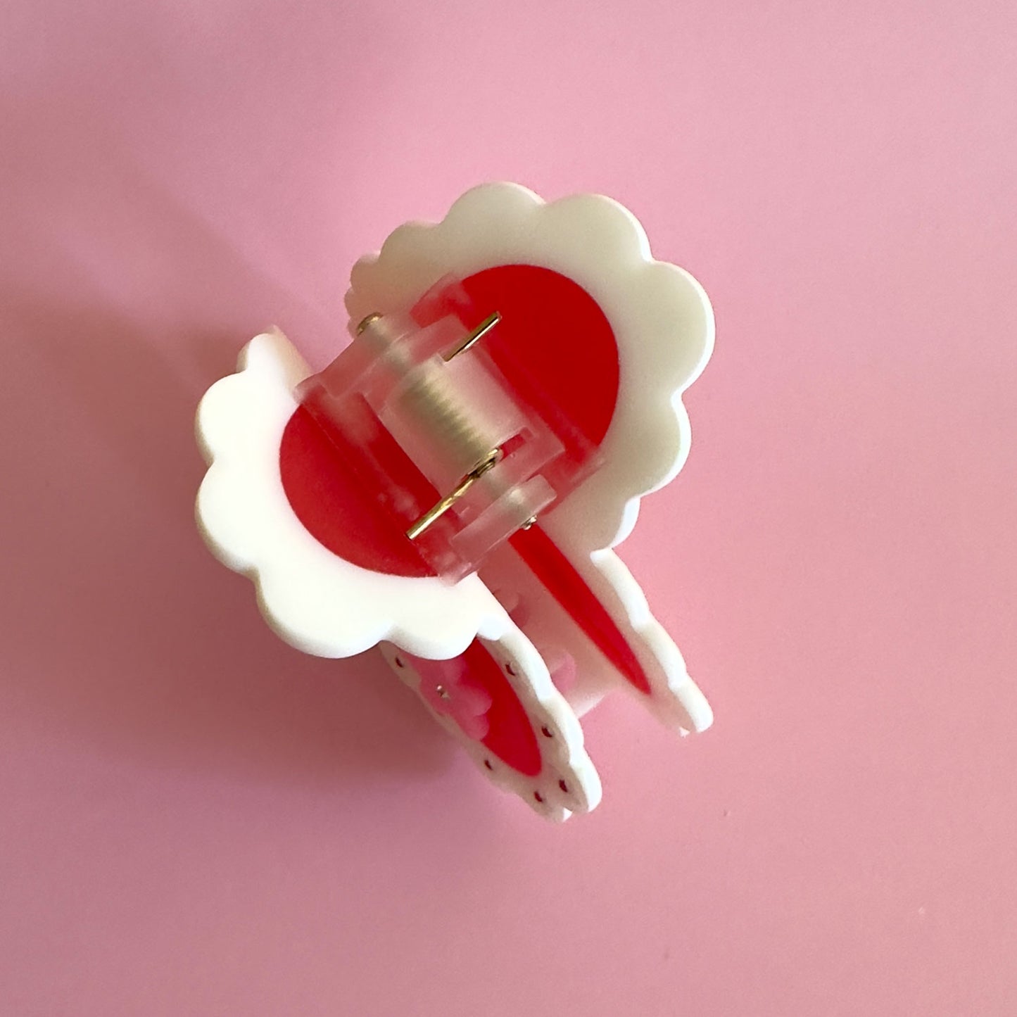 Be my valentine with this cellulose acetate Laced Heart Hair Claw on mate finish