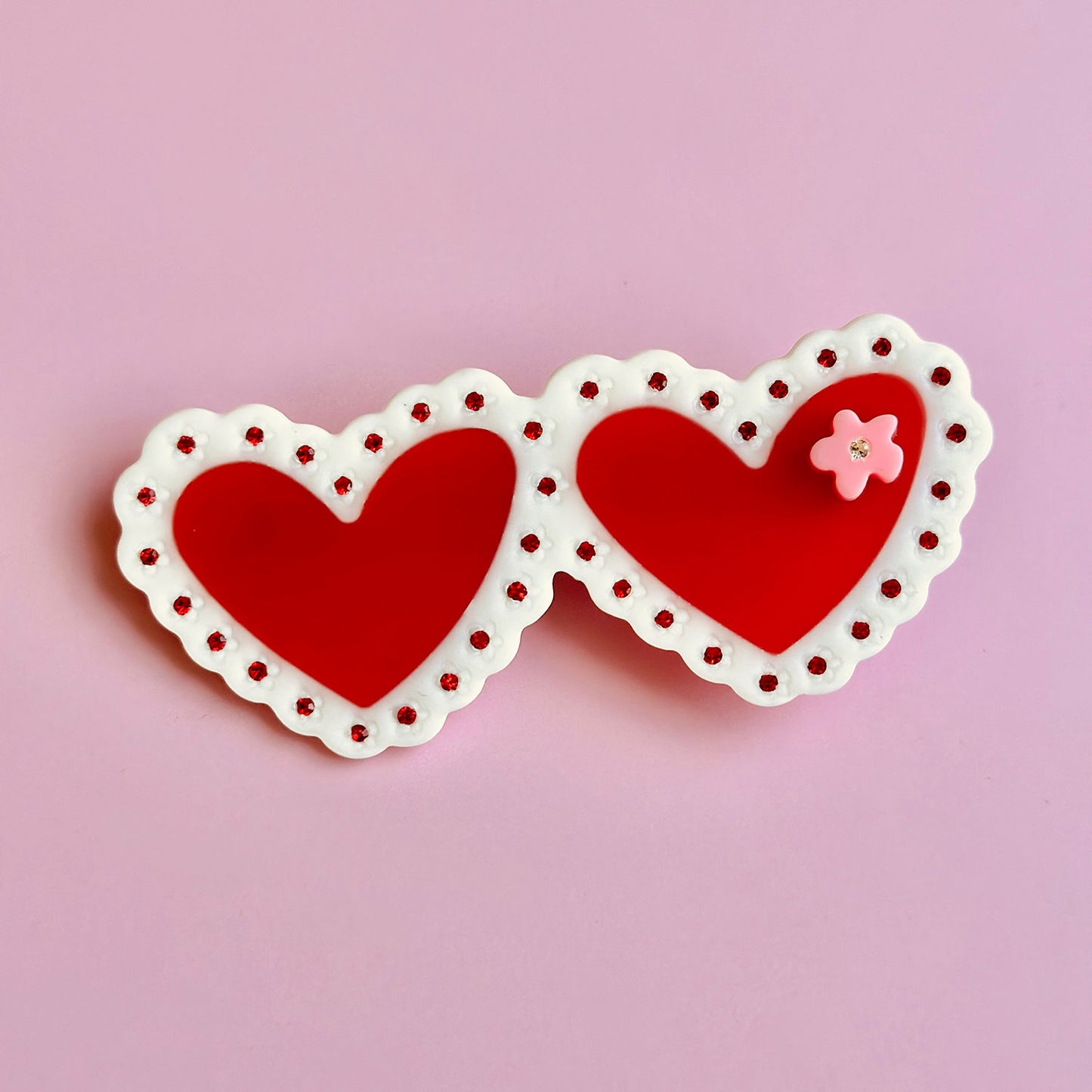 Be my Valentine with this Laced Hearts Hair Clip with mate finishing on cellulose acetate!