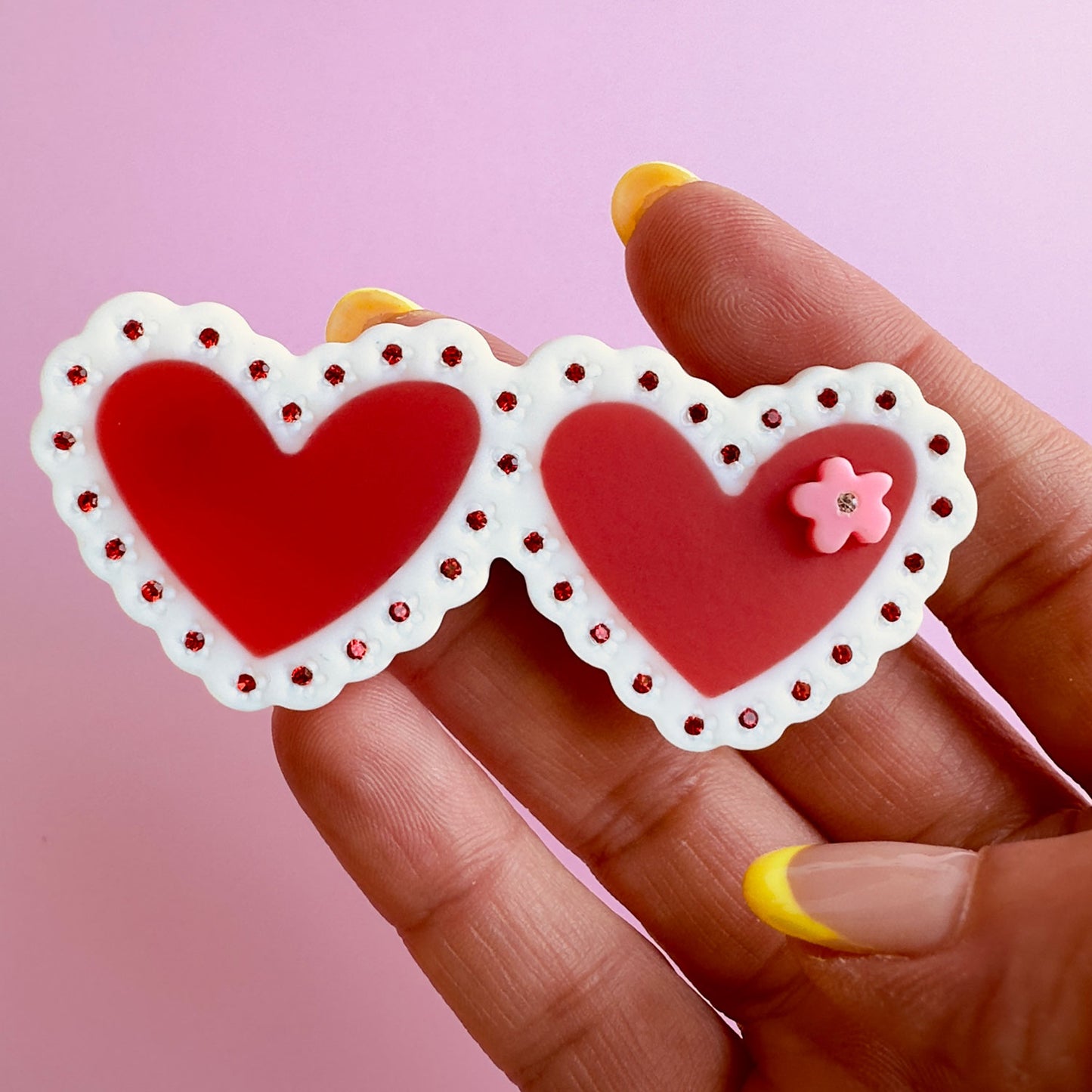 Be my Valentine with this Laced Hearts Hair Clip with mate finishing on cellulose acetate!