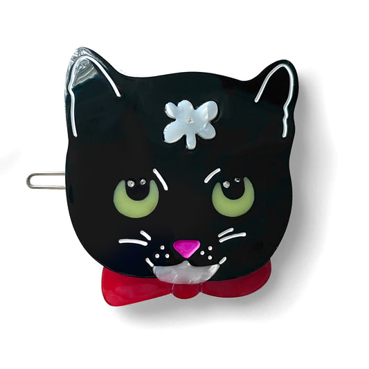 Black cat hair clip with white daisy. 