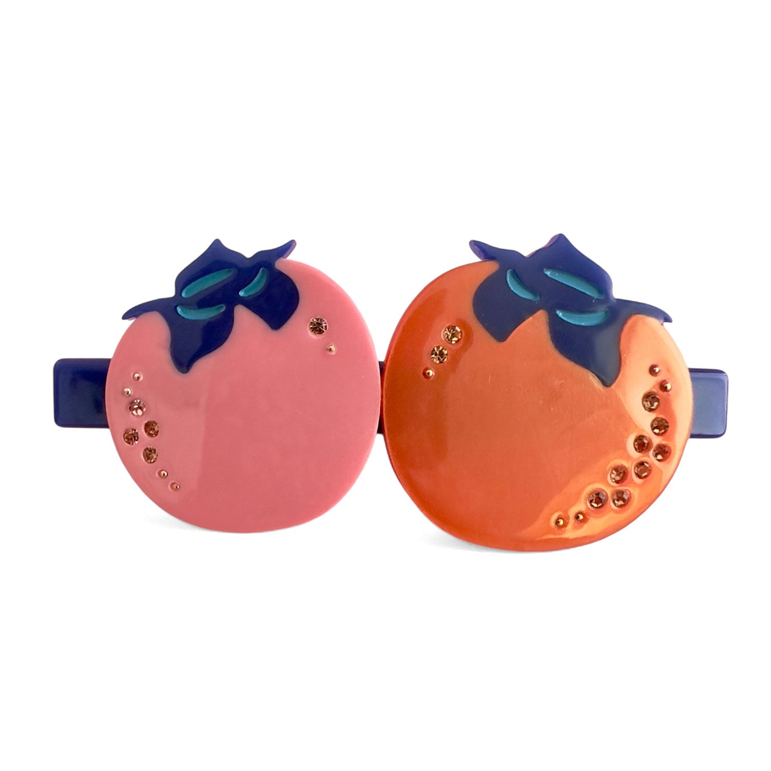 Persimmons hair barrette on pink and orange