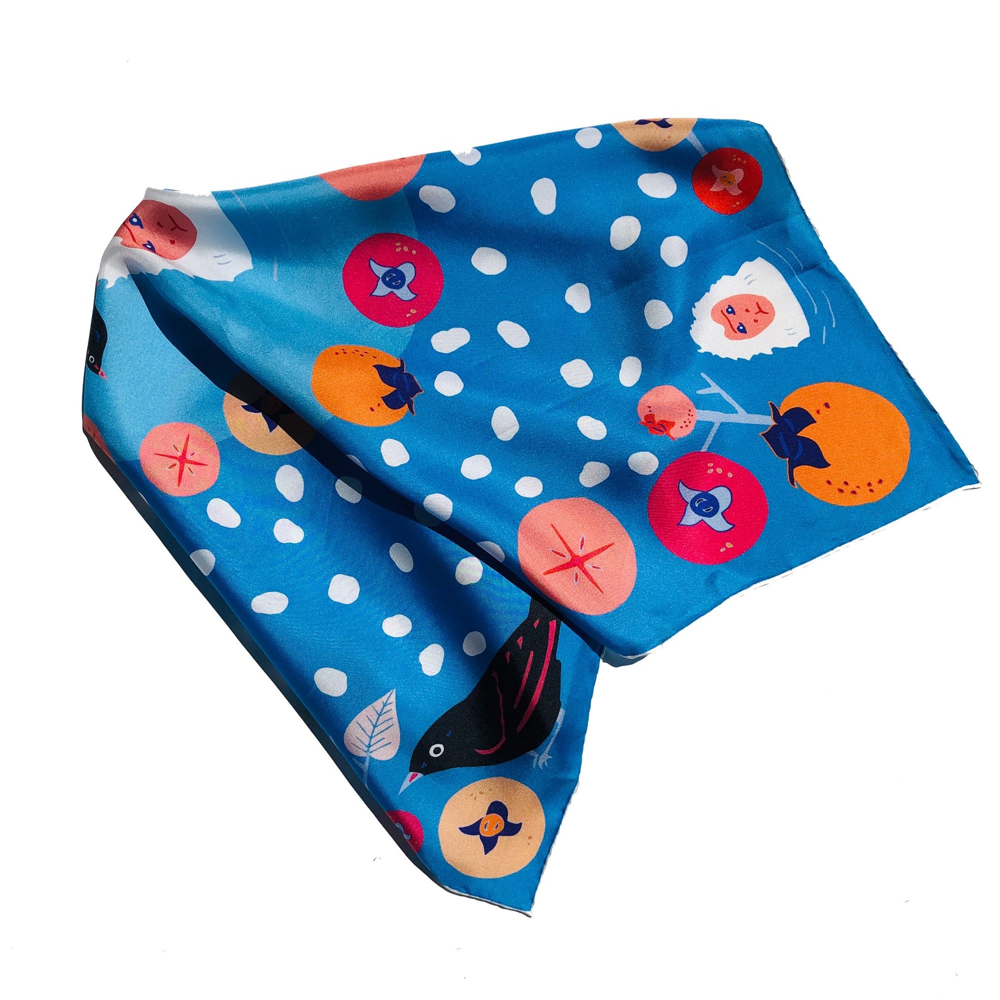 Tied silk scarf with white polka dots , snow monkeys and persimmons.