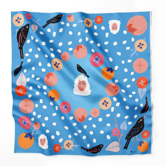 Persimmons and monkeys on a blue silk scarf.