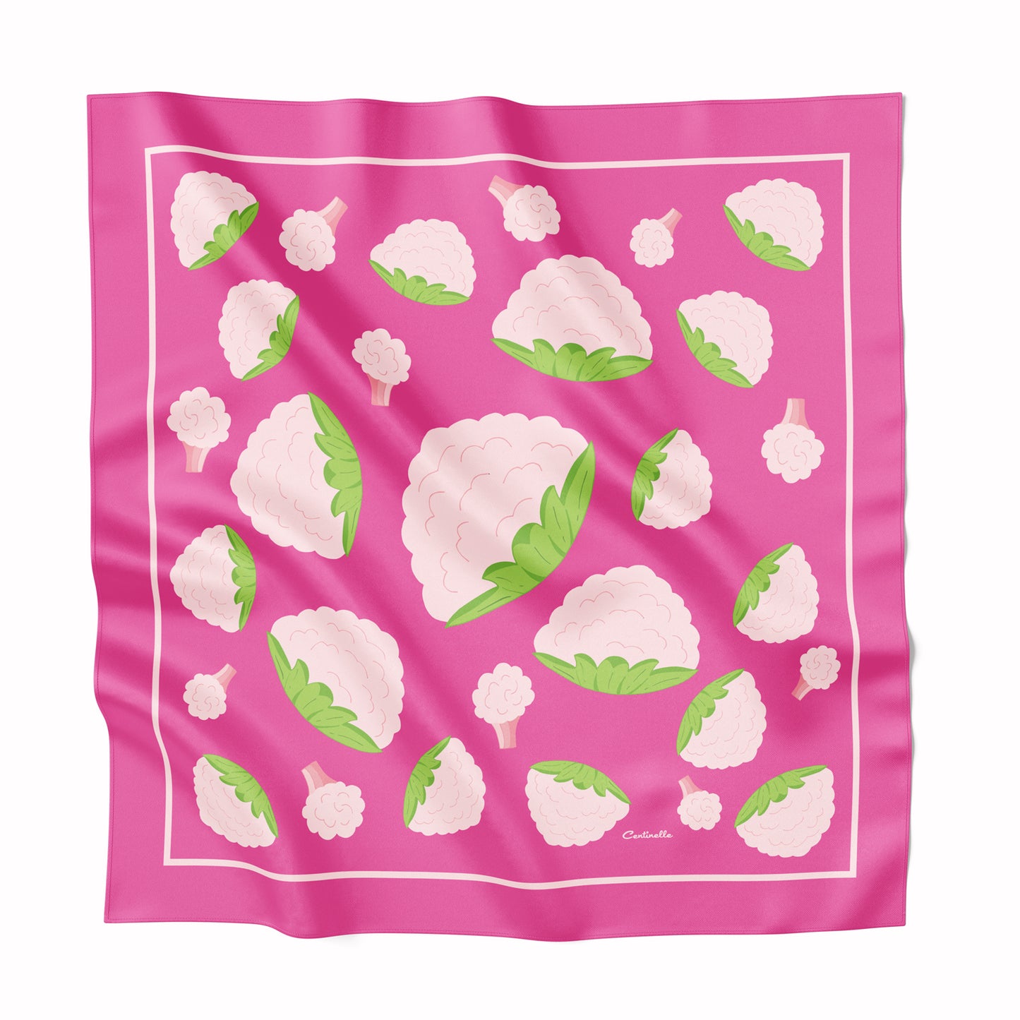 Cauliflower on a hot pink silk scarf.