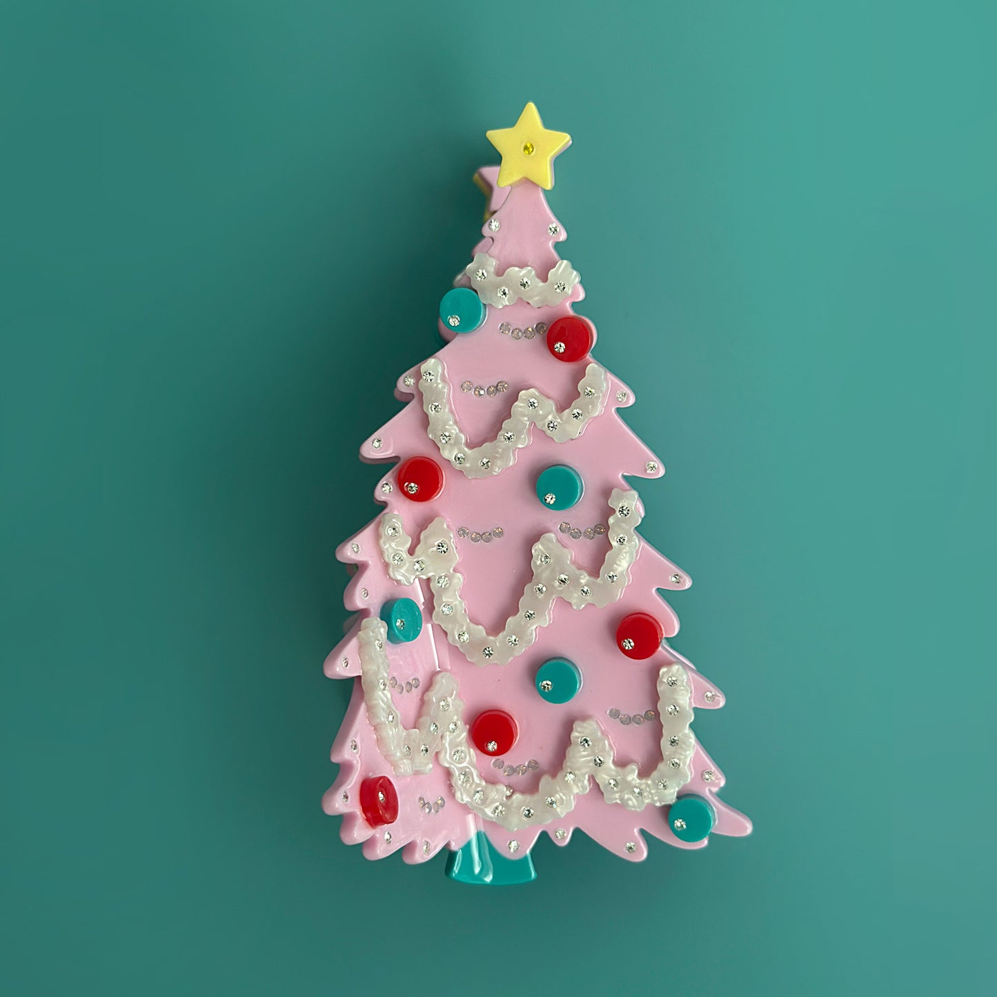 Pink Christmas Tree Hair Claw with Twinkly lights and frosting decorations are just right to get festive this holiday 