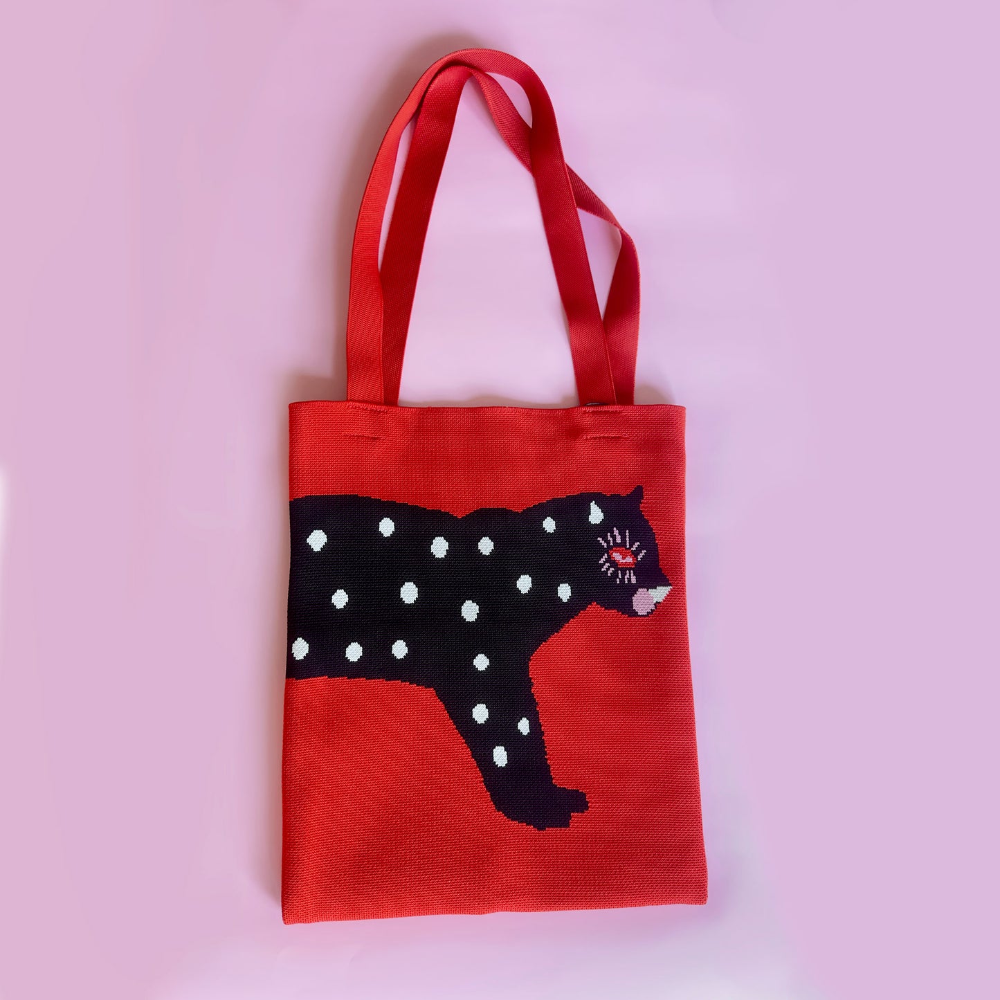 Polka cat with polka dots knit tote bag in red and black.
