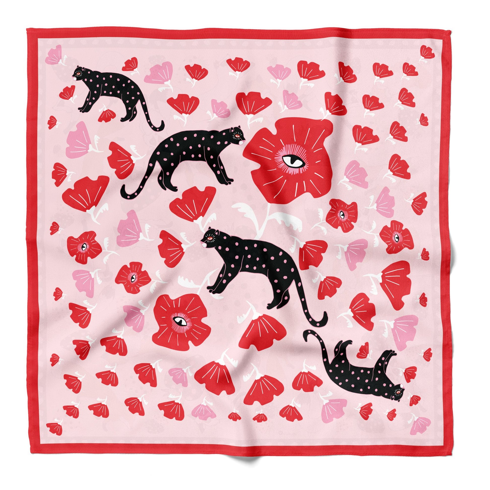 Black cats and red poppies on a cotton silk blend bandana, pink with a red border.