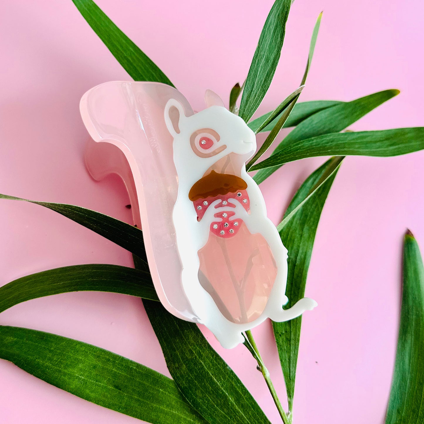 Pink squirrel centinelle hair claw clip from hair accessories collection.
