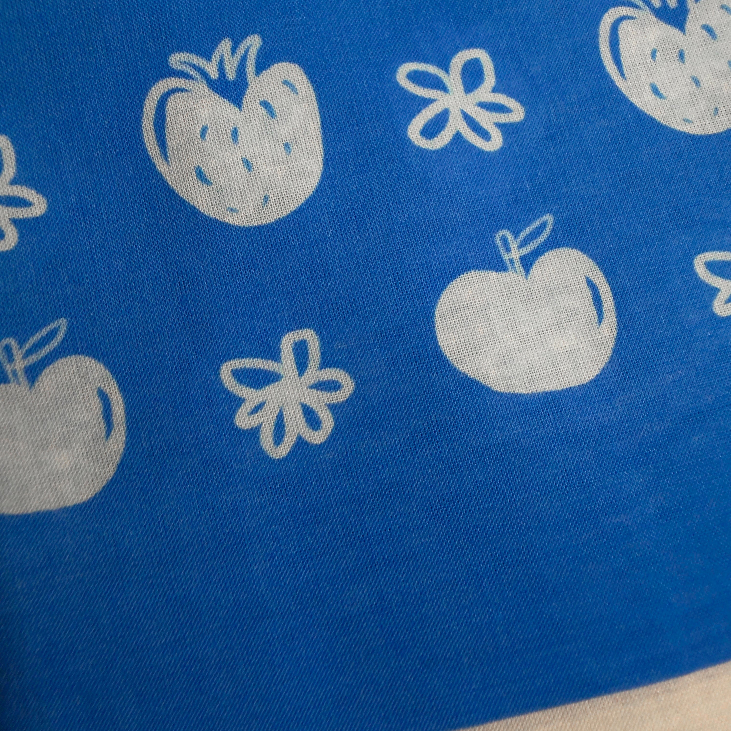 blue bandana with white flowers, apples and strawberries
